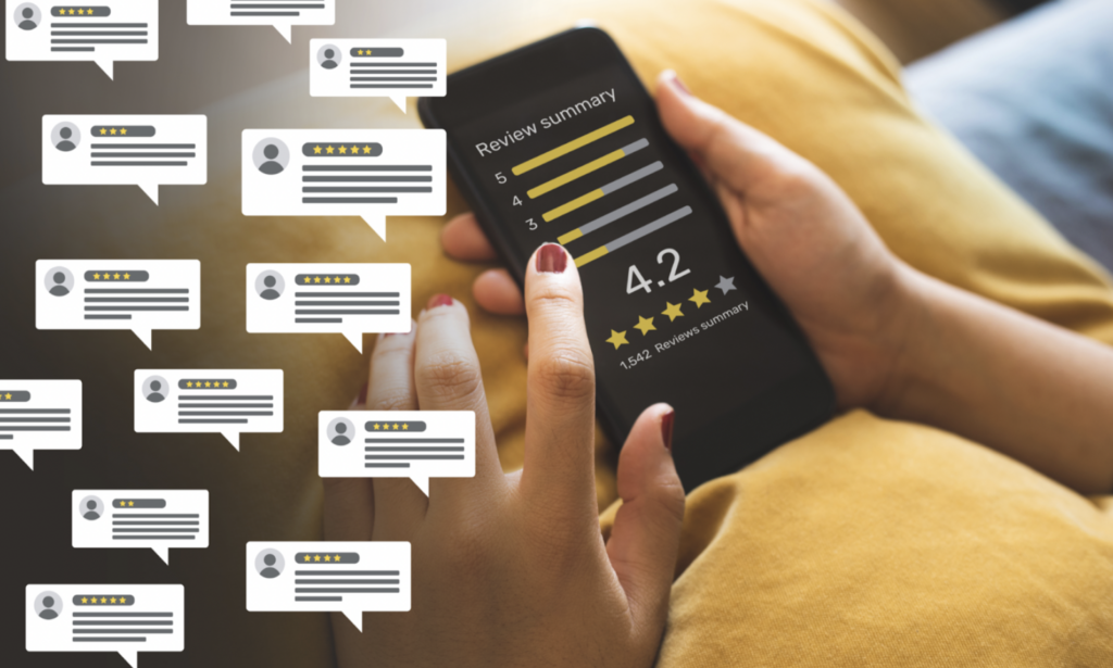 consumer reviews concept with bubbles of people reviews and smartphone showing review summary with 4.2 average stars.