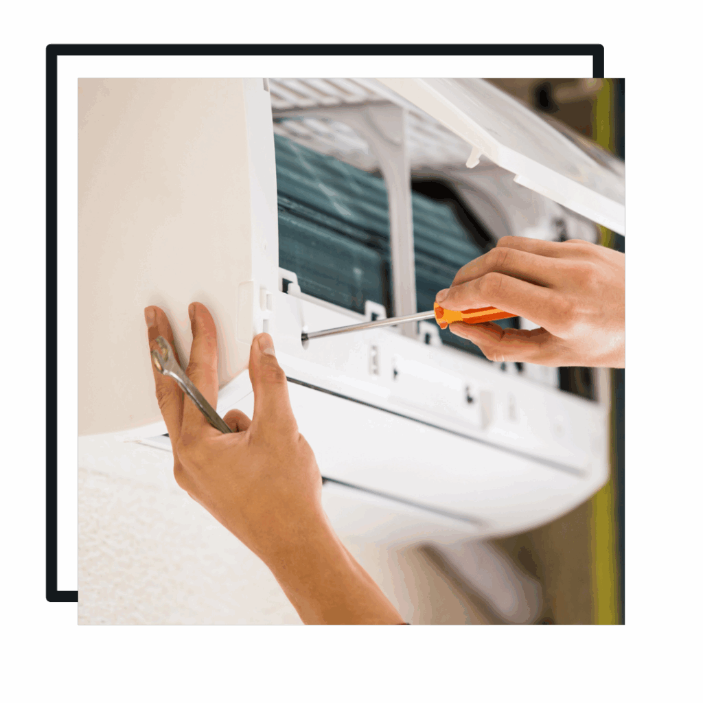 technician finishing an AC installation service