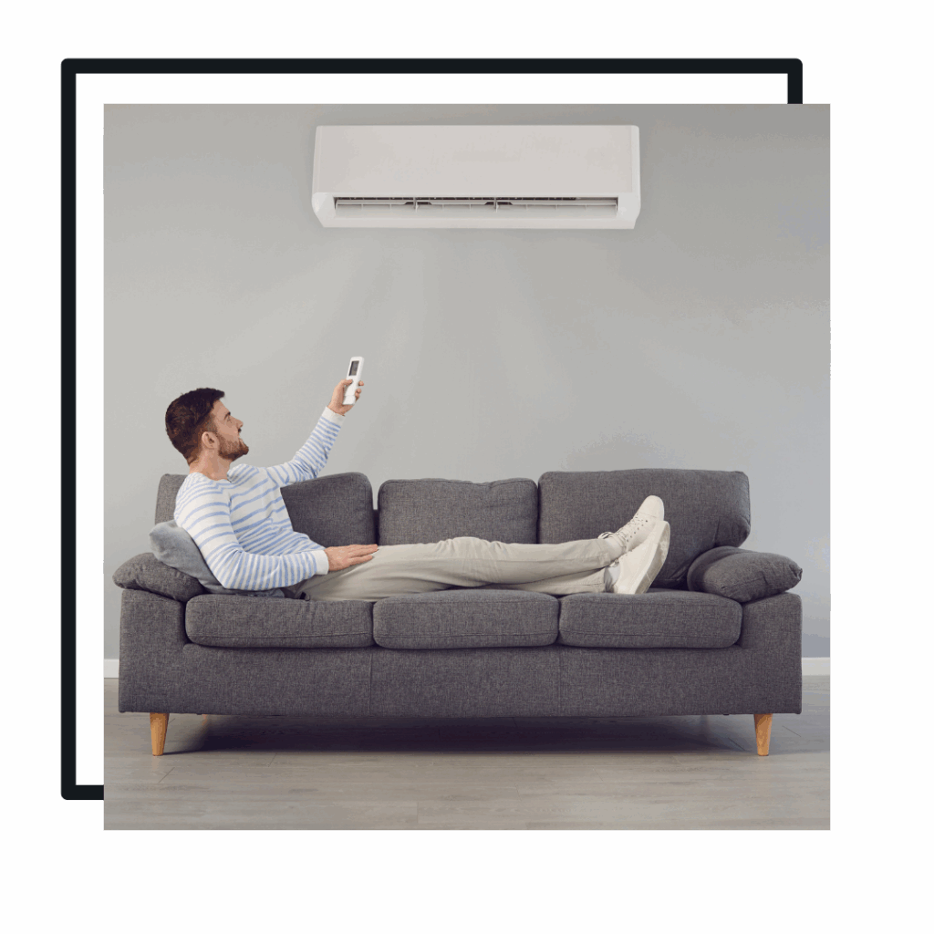 man turning on his air conditioning system